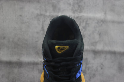 New Balance NB9060 Preto e Dourado
